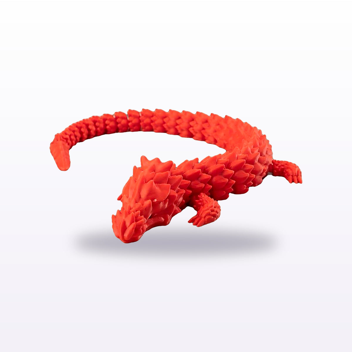 Large flexi dragon in red, curled
